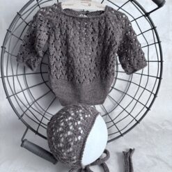 Conjunto de body corto y gorrito a juego